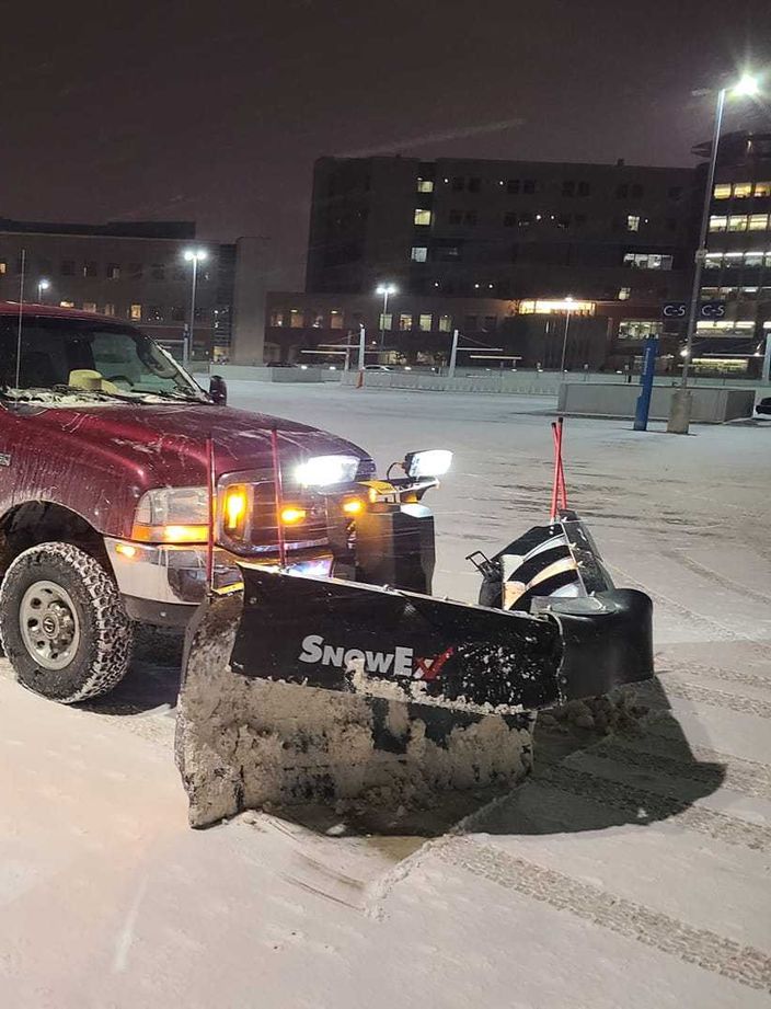 snow plowing with a truck