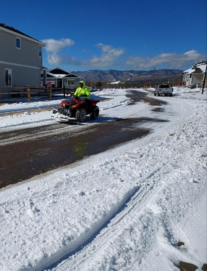 snow plowing with a truck