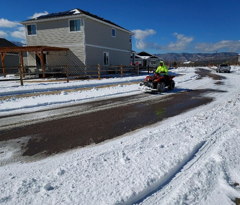 Cleared driveway after a Colorado Springs snowstorm
