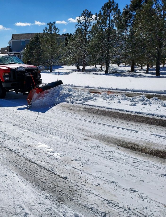snow plowing with a truck